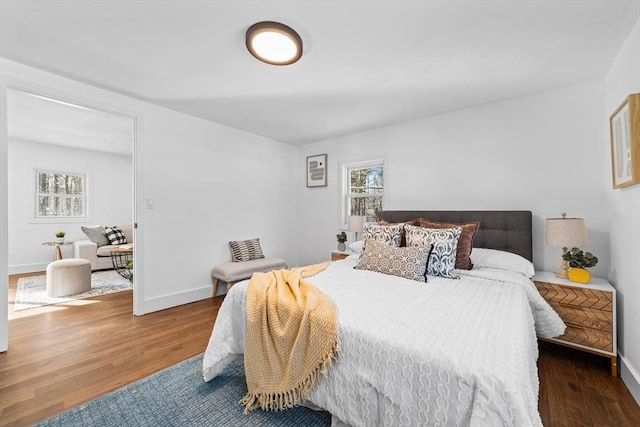 bedroom featuring dark wood-type flooring