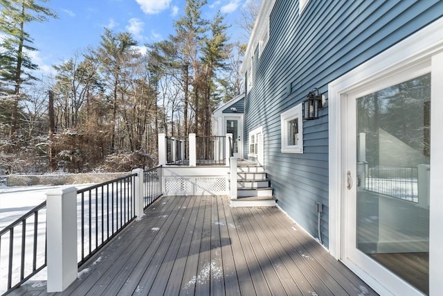 view of snow covered deck