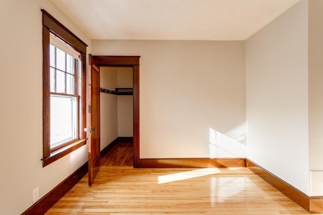 174 Vernon St, Worcester, MA 01610 - unfurnished bedroom with wood finished floors and baseboards