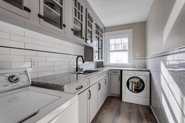 174 Vernon St, Worcester, MA 01610 - laundry area featuring washer / clothes dryer, dark wood-type flooring, and cabinet space