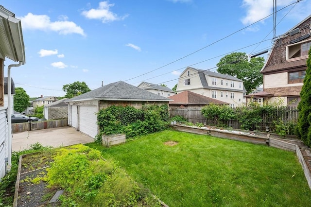 174 Vernon St, Worcester, MA 01610 - view of yard with a garage and a garden