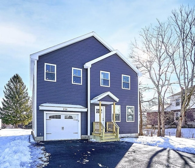 view of front of home with a garage