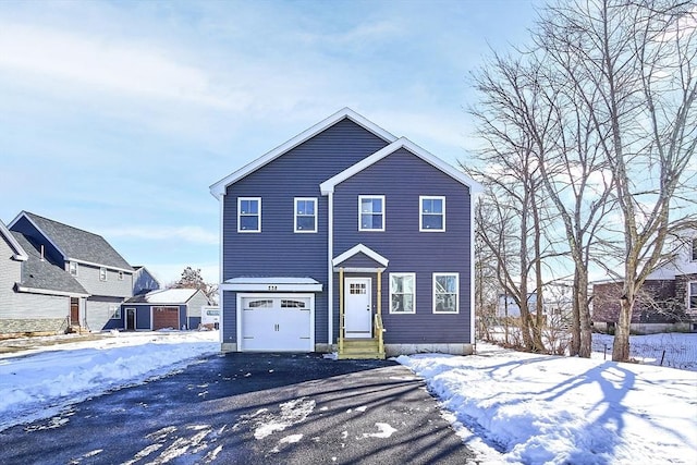 front of property featuring a garage