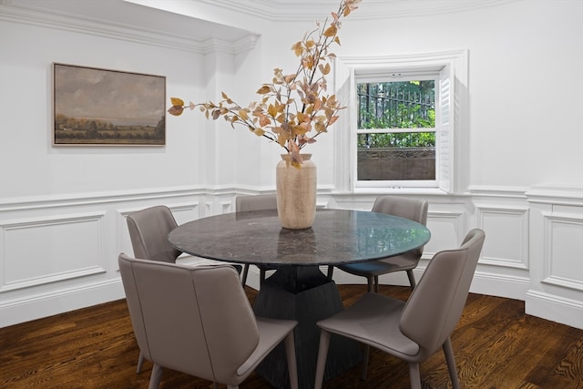 dining room with dark wood-type flooring and ornamental molding