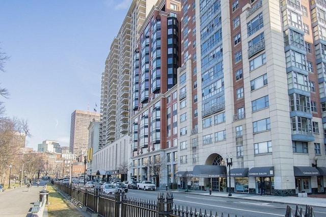 view of building exterior featuring a view of city