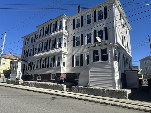 view of front of property with a chimney