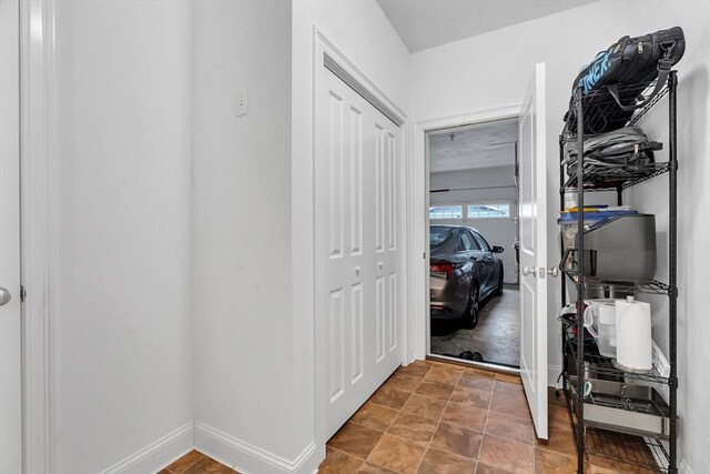 131 Rogerson Xing Unit 131, Uxbridge, MA 01569 - hall featuring baseboards and stone finish floors