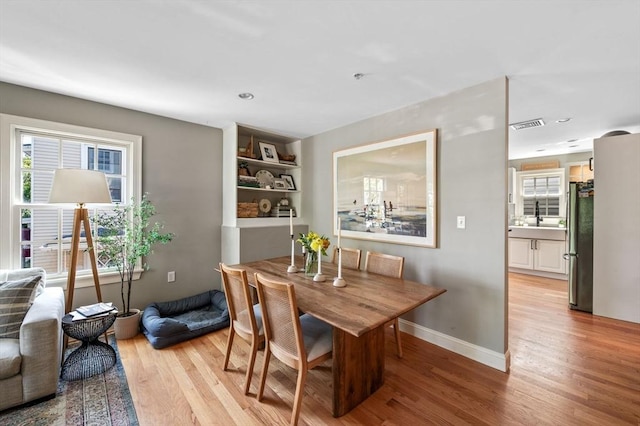 2 Hawthorne Blvd Unit 4, Salem, MA 01970 - dining room featuring light wood finished floors