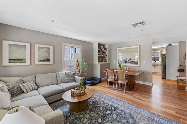 2 Hawthorne Blvd Unit 4, Salem, MA 01970 - living room featuring light wood finished floors and recessed lighting