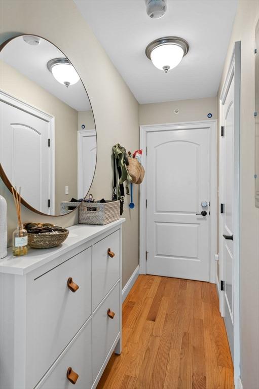 2 Hawthorne Blvd Unit 4, Salem, MA 01970 - doorway with light wood-style flooring and baseboards