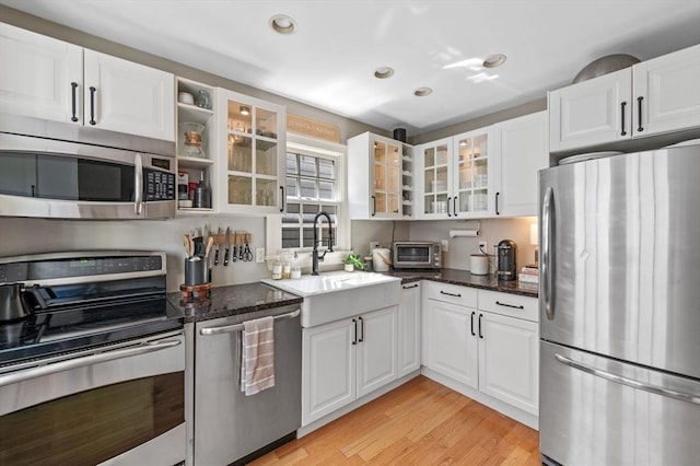 2 Hawthorne Blvd Unit 4, Salem, MA 01970 - kitchen featuring stainless steel appliances, white cabinets, and recessed lighting