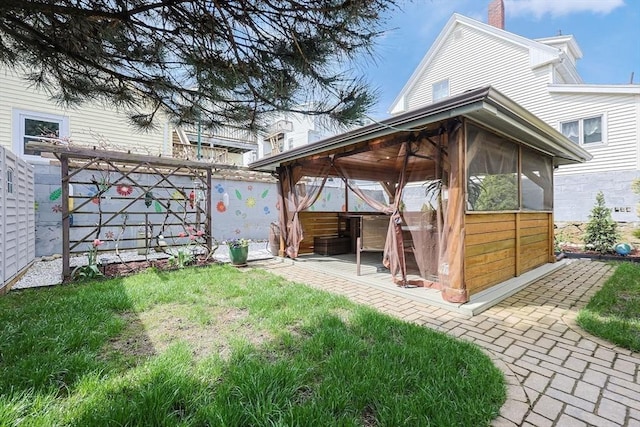 view of yard featuring a sunroom