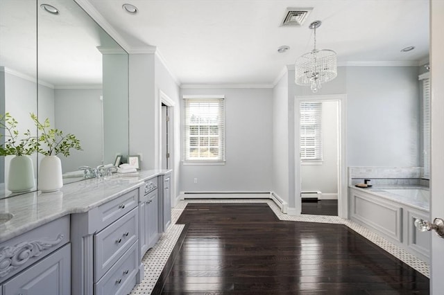 bathroom featuring visible vents, wood-type flooring, crown molding, baseboards, and a chandelier