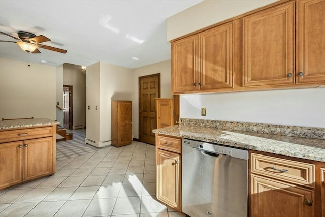 kitchen with light stone counters, stainless steel dishwasher, light tile patterned flooring, and ceiling fan