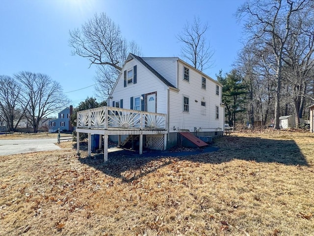 rear view of house with a deck