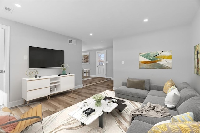 living room featuring light wood-type flooring