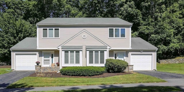 3 Oakwood Ln Unit 3, Worcester, MA 01604 - view of front of house with a garage, driveway, and a front yard