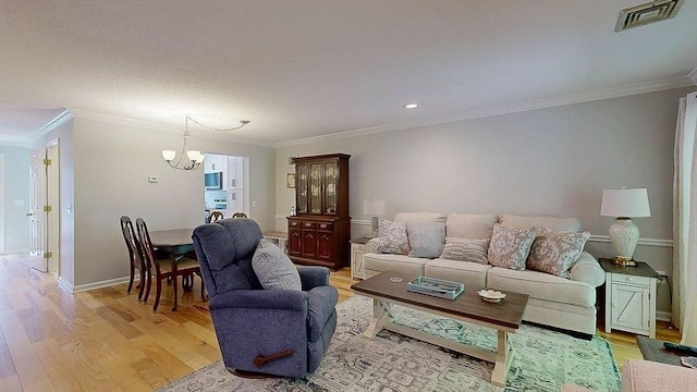 3 Oakwood Ln Unit 3, Worcester, MA 01604 - living area with a chandelier, light wood-style floors, crown molding, and recessed lighting