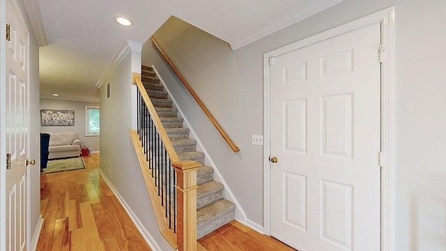 3 Oakwood Ln Unit 3, Worcester, MA 01604 - stairs with wood finished floors, crown molding, and recessed lighting