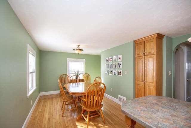 dining room featuring light wood-type flooring