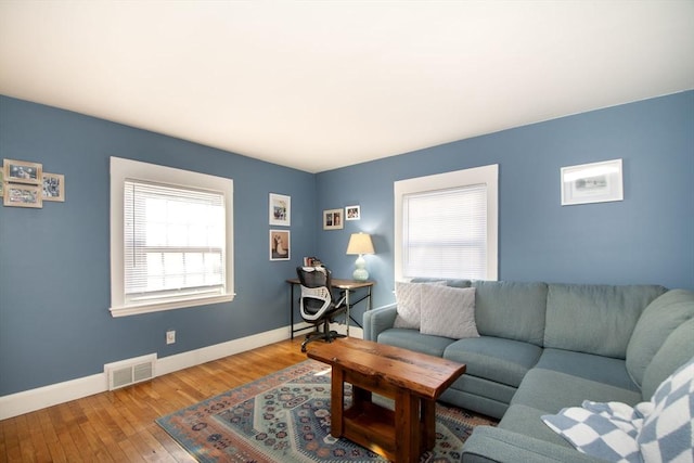 living room with hardwood / wood-style floors