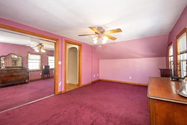 bonus room featuring ceiling fan, carpet, and lofted ceiling