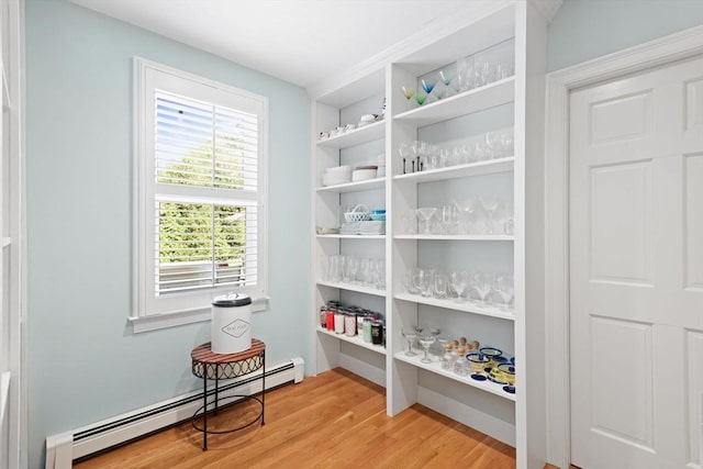 pantry with a baseboard radiator