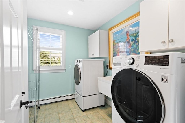 washroom featuring washing machine and clothes dryer, cabinet space, recessed lighting, baseboards, and a baseboard heating unit