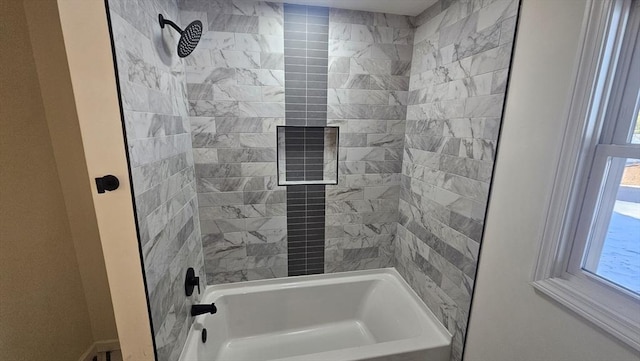 bathroom featuring  shower combination