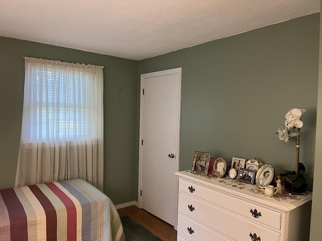 48 Birchcroft, Leominster, MA 01453 - bedroom featuring dark wood-style floors and baseboards