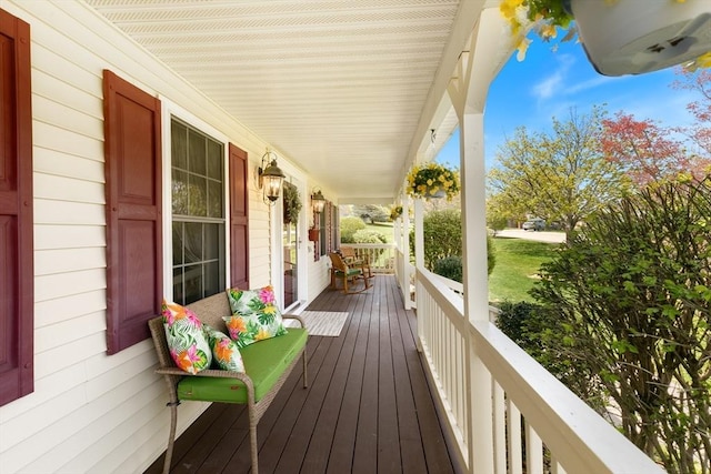 wooden deck featuring covered porch