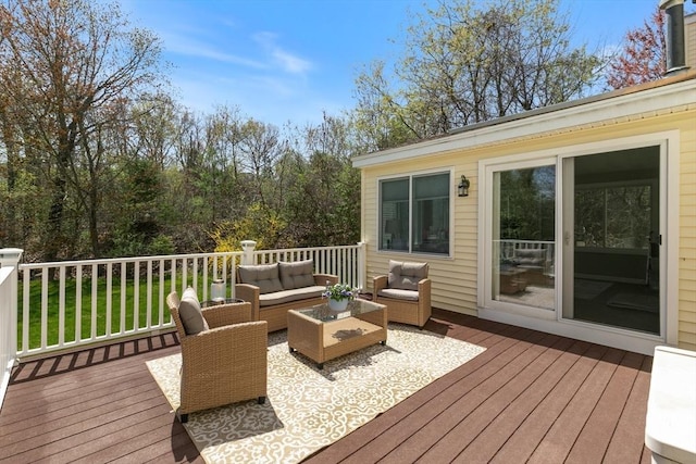 wooden deck with outdoor lounge area