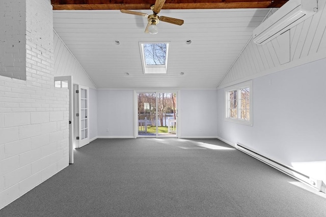 empty room with a baseboard heating unit, ceiling fan, baseboards, dark carpet, and lofted ceiling