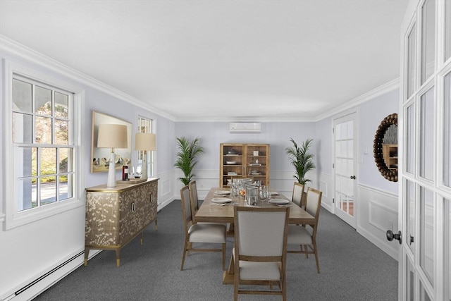 dining area featuring plenty of natural light, baseboard heating, and ornamental molding