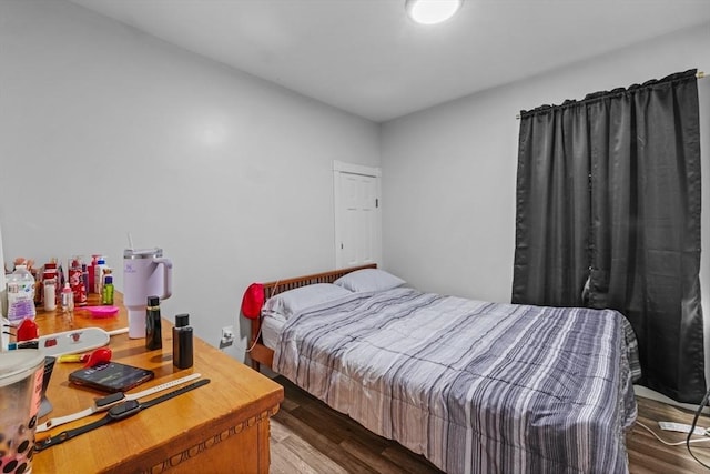 bedroom featuring hardwood / wood-style floors