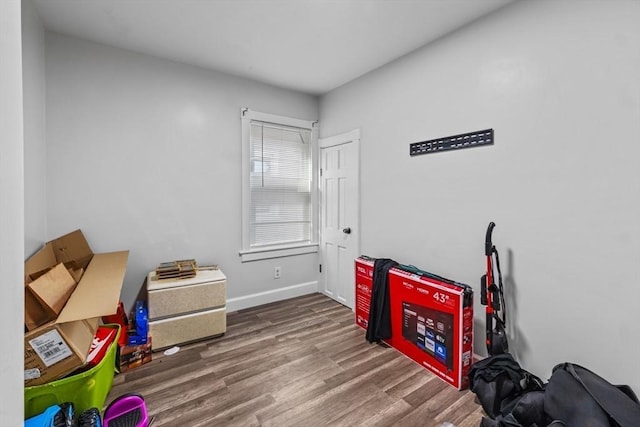 misc room with wood-type flooring