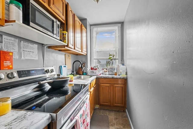 kitchen featuring sink and appliances with stainless steel finishes