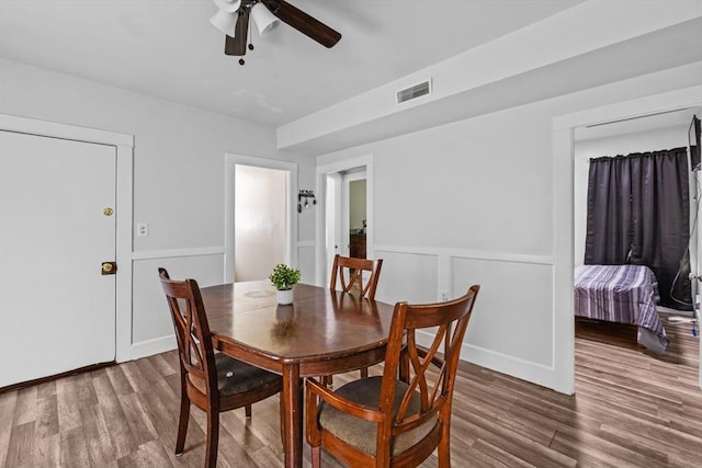 dining room featuring hardwood / wood-style flooring and ceiling fan