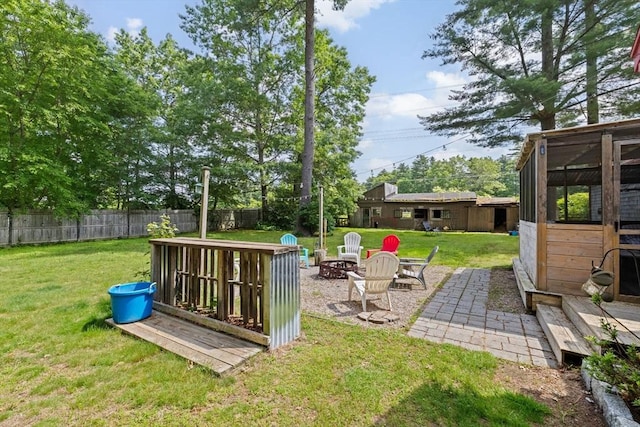 18 Russell Holmes Way, Carver, MA 02330 - fenced backyard with an outdoor fire pit