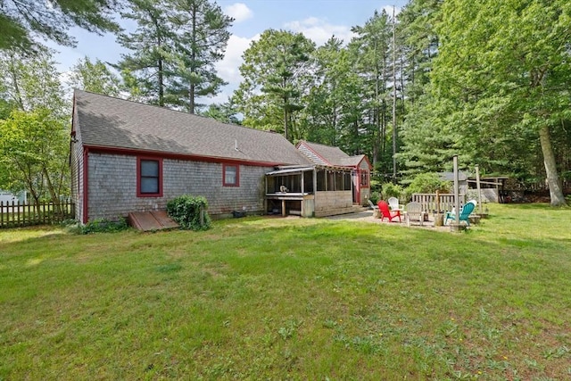 18 Russell Holmes Way, Carver, MA 02330 - rear view of property with a sunroom and roof with shingles