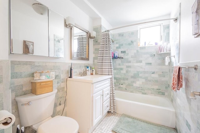 28 Edison Grn Unit 2, Boston, MA 02125 - bathroom with tile walls, shower / bath combo, vanity, and wainscoting