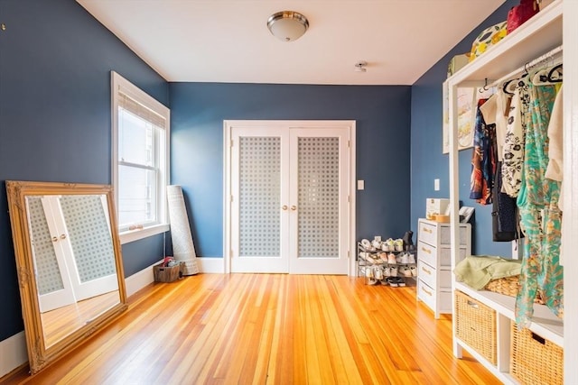 28 Edison Grn Unit 2, Boston, MA 02125 - bedroom with wood finished floors and french doors