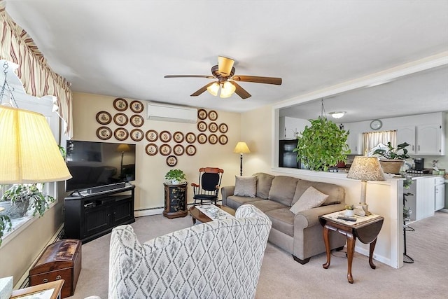 carpeted living room featuring a wealth of natural light, a wall mounted air conditioner, ceiling fan, and baseboard heating