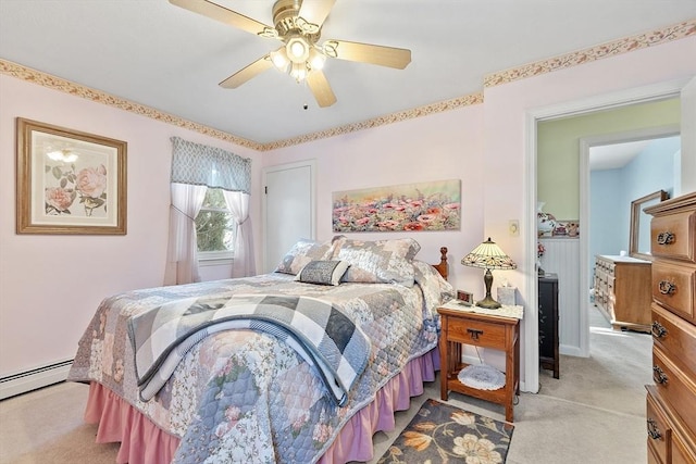 bedroom with light colored carpet, ceiling fan, and baseboard heating