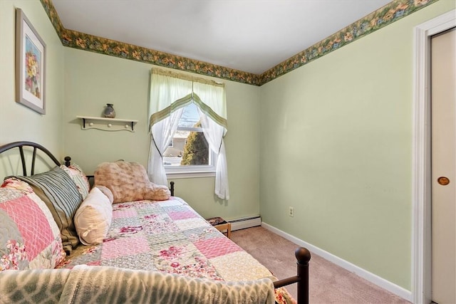 carpeted bedroom featuring a baseboard radiator