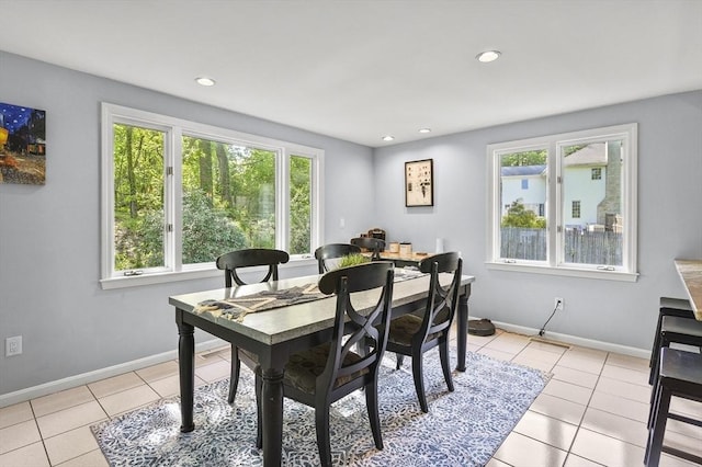 79 Flanagan Dr, Framingham, MA 01701 - dining space featuring healthy amount of natural light, light tile patterned floors, baseboards, and recessed lighting