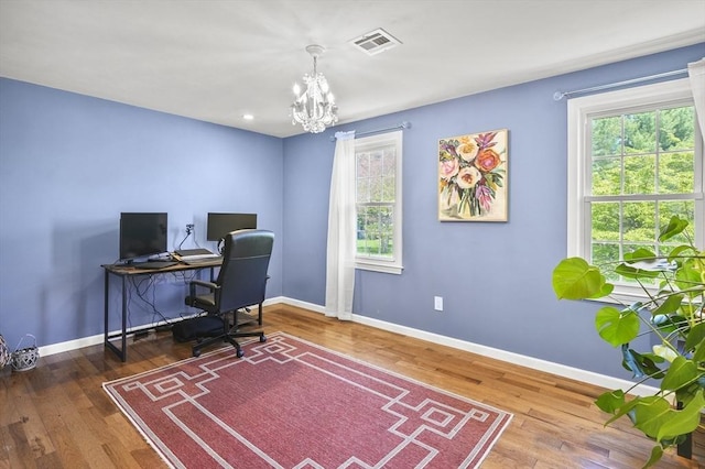 79 Flanagan Dr, Framingham, MA 01701 - home office with a chandelier, baseboards, and healthy amount of natural light