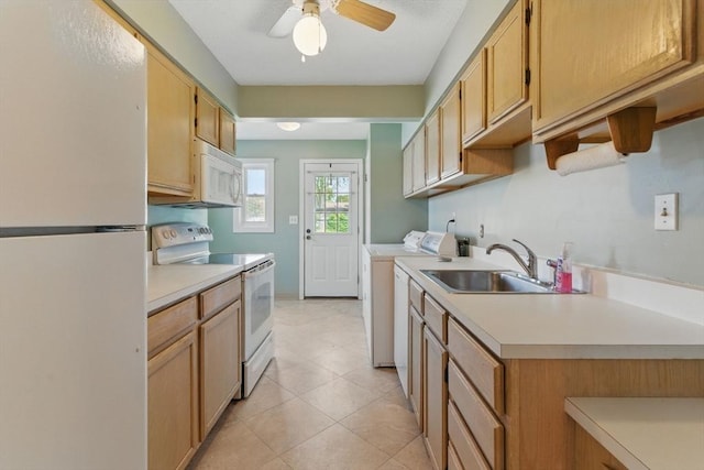 1064 James St Unit 1064, Chicopee, MA 01022 - kitchen featuring white appliances, a sink, washing machine and clothes dryer, light countertops, and a ceiling fan