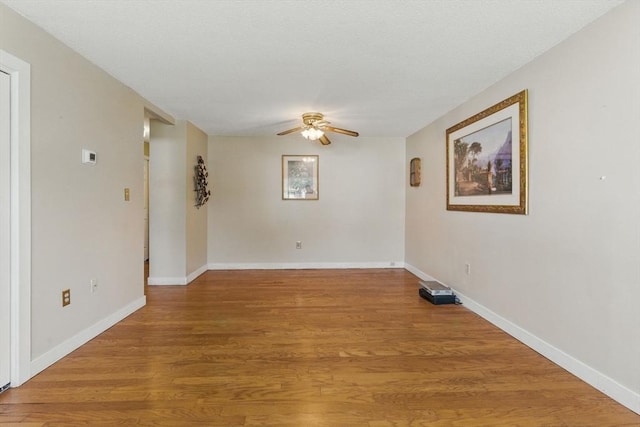 1064 James St Unit 1064, Chicopee, MA 01022 - empty room featuring ceiling fan, light wood-type flooring, and baseboards