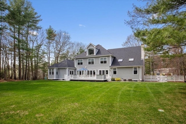 54 Wagon Rd, Walpole, MA 02081 - rear view of house with a deck